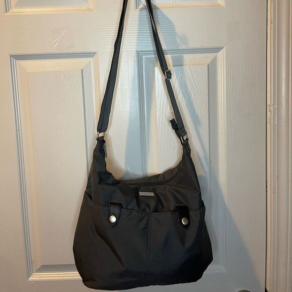 Baggallini gray Nylon shoulder bag with silver tone hardwares adjustable strap. - Picture 1 of 13